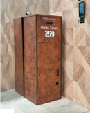 Caixa de encomendas MaxBox em ACM corten personalizada instalada no hall de condomínio moderno
